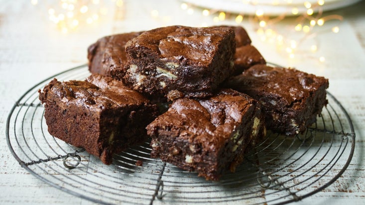 A stack of mince pie brownies on a cooling rack